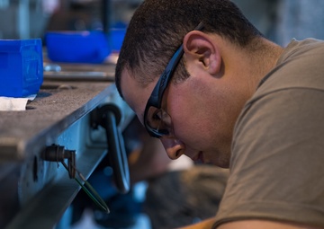 Munitions Airmen pay it forward