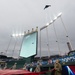 Servicemembers from Whiteman Air Force Base watch B-2 flyover during Kansas City Royals opening game