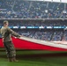 Airmen from Whiteman Air Force Base unfurl flag at Kansas City Royals opening game