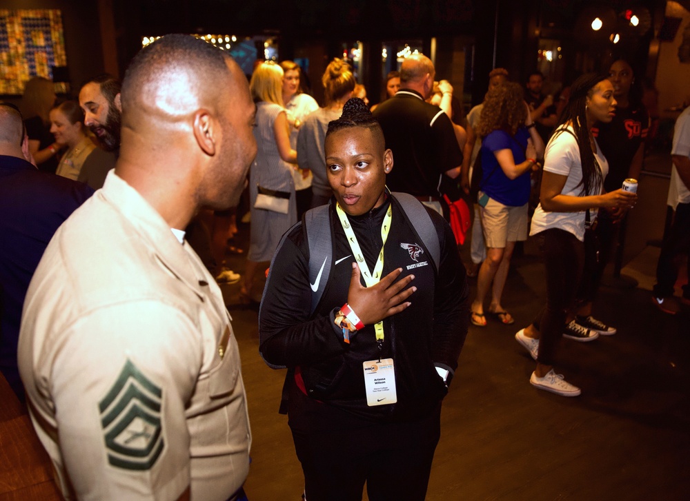 Marines interact with basketball influencers at 2019 Womens Basketball Coaches Association Convention