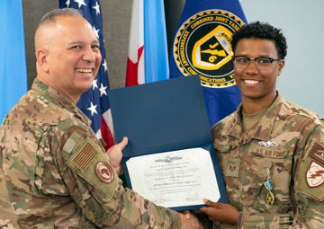 CJTF-HOA U.S. Air Force Airman earns U.S. Navy EIWS