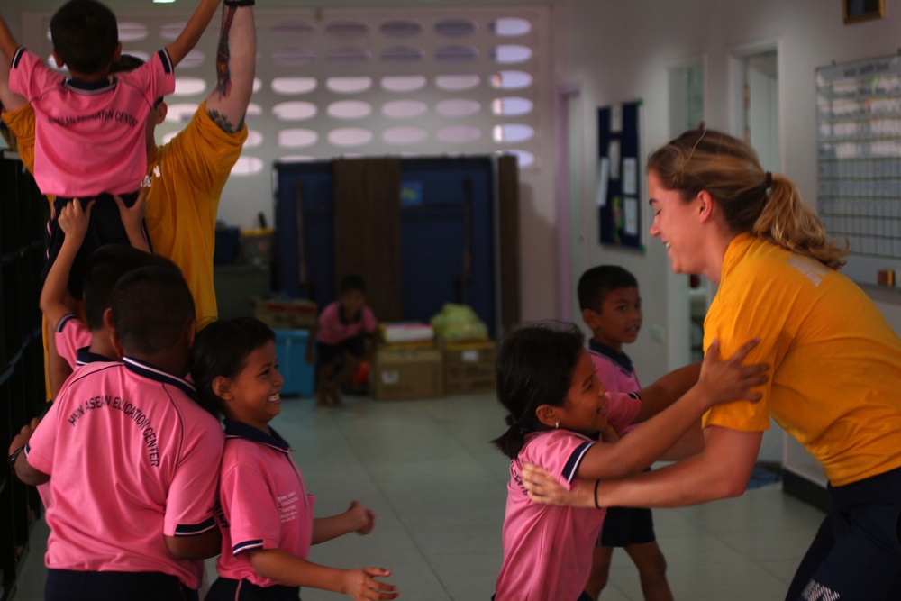 Sailors volunteer in the Thailand community during a U.S. 7th Fleet Flagship USS Blue Ridge community relations event in Laem Chabang.