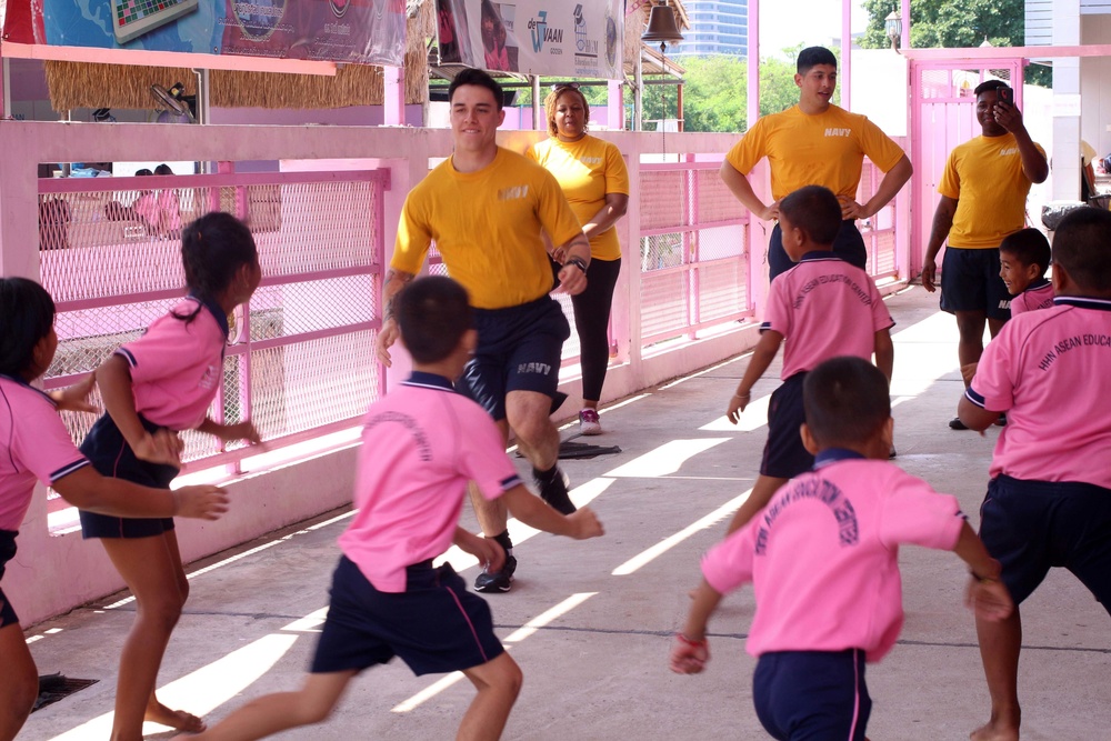 Sailors volunteer in the Thailand community during a U.S. 7th Fleet Flagship USS Blue Ridge community relations event in Laem Chabang.