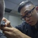 USS Fort McHenry Barbershop Keeps Sailors Looking Sharp