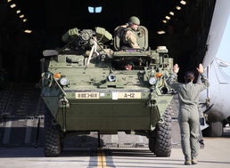 3rd Battalion, 161st Infantry Regiment loads Strykers into C-17