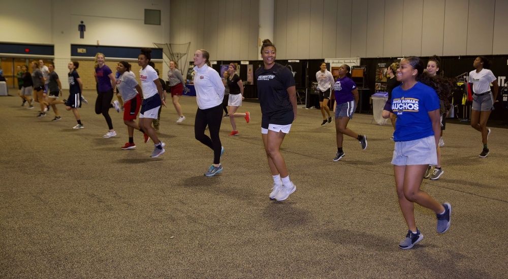 Marines lead a women’s basketball workout at WBCA