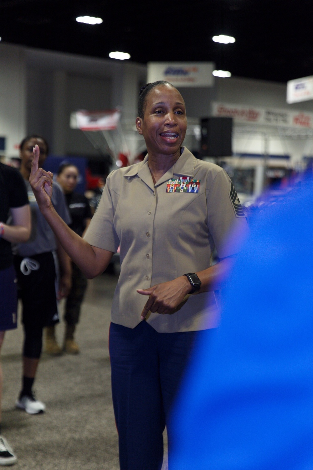 Marines lead a women’s basketball workout at WBCA