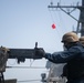U.S. Sailor fires a .50 caliber machine gun during a live-fire exercise
