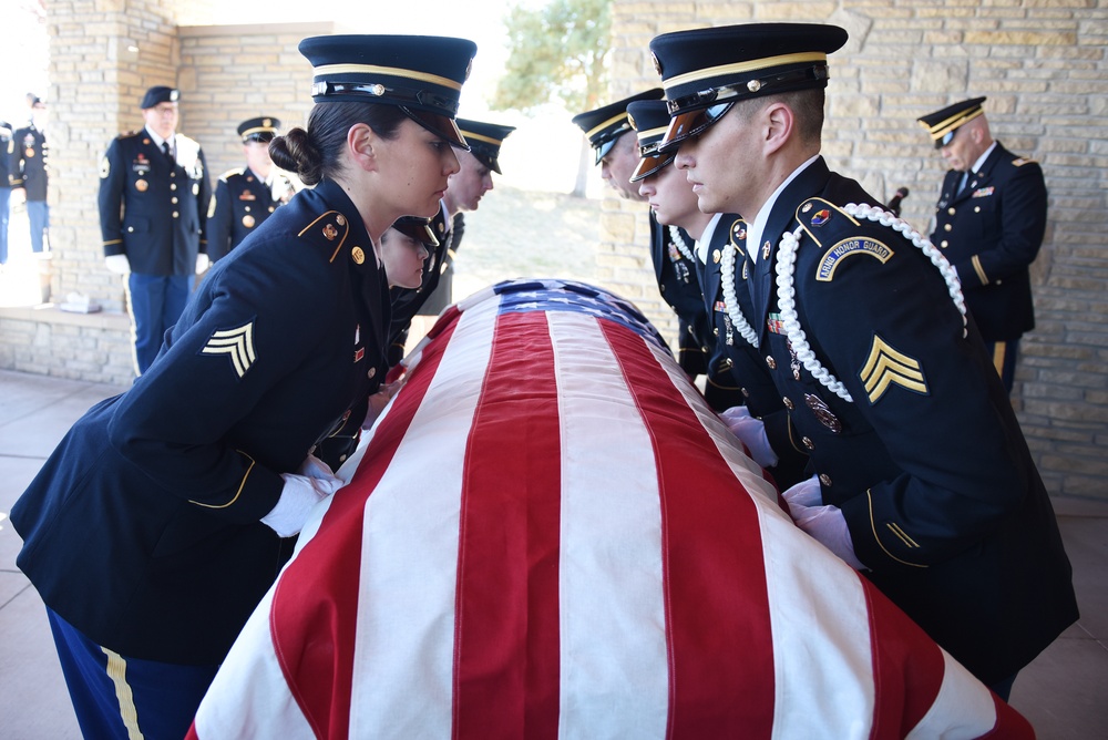 The Idaho Army Honor Guard renders funeral honors