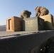 Forward Support Company, 1-16 Infantry Soldiers transport and unload ammunition for live-fire ranges