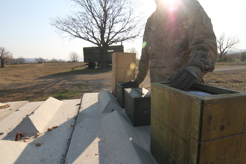 Forward Support Company, 1-16 Infantry Soldiers transport and unload ammunition for live-fire ranges