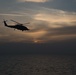 A Sea Hawk helicopter flies over the Strait of Hormuz