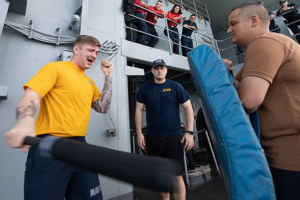 The aircraft carrier USS John C. Stennis holds a non-lethal weapons and Oleoresin Capsicum (OC) spray training course
