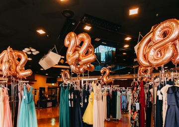 USO Iwakuni supplies dresses to air station teens