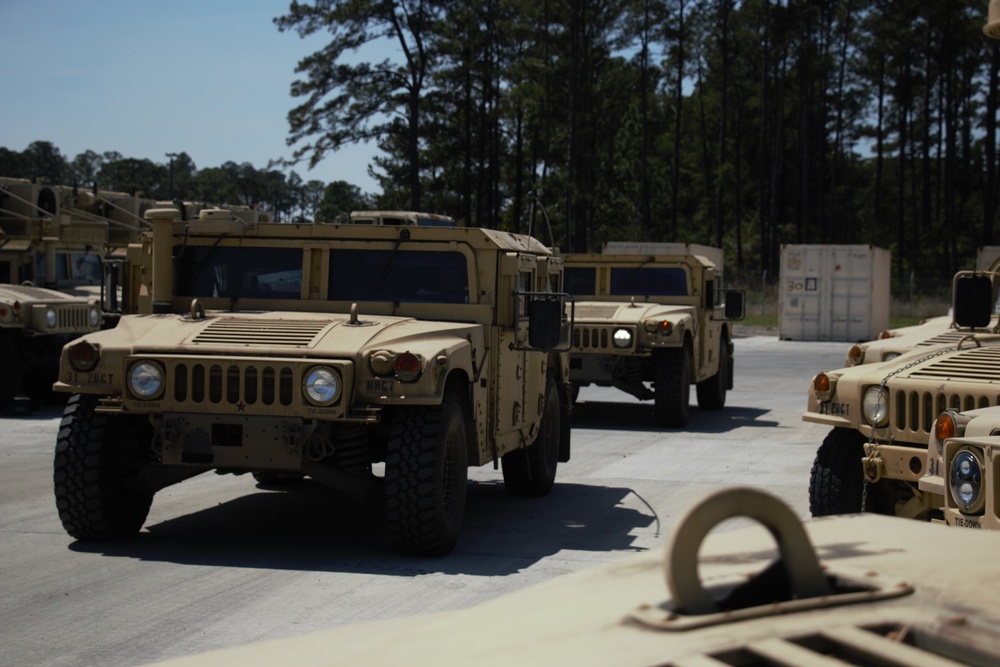 Spartan Soldiers Stage Vehicles for NTC