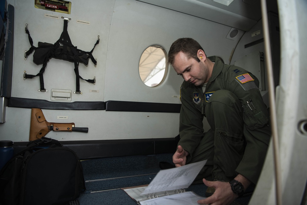 Vance Instructor pilot goes over flight log
