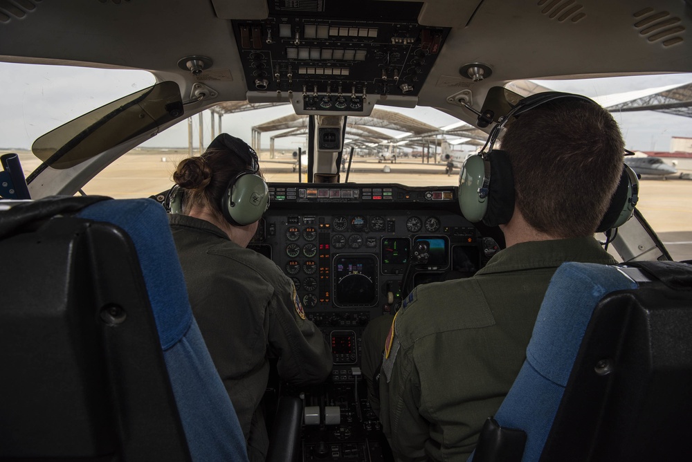 Vance pilots perform pre-flight checks