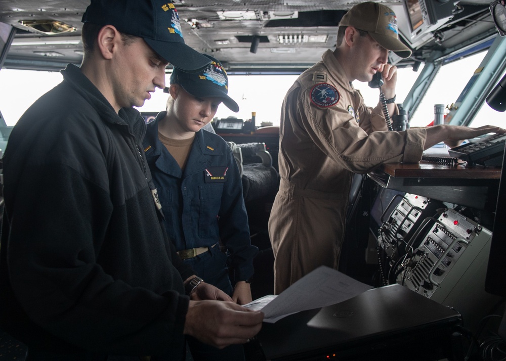 U.S. Sailor gives a weather brief