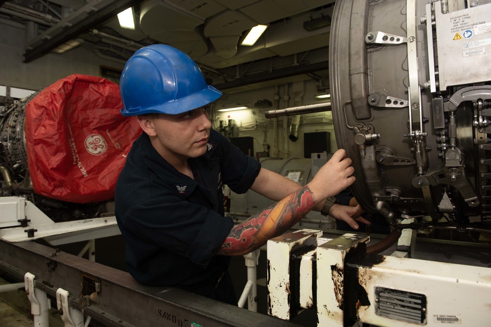U.S. Sailor installs jet engine