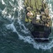 AAVs load into the USS Harpers Ferry