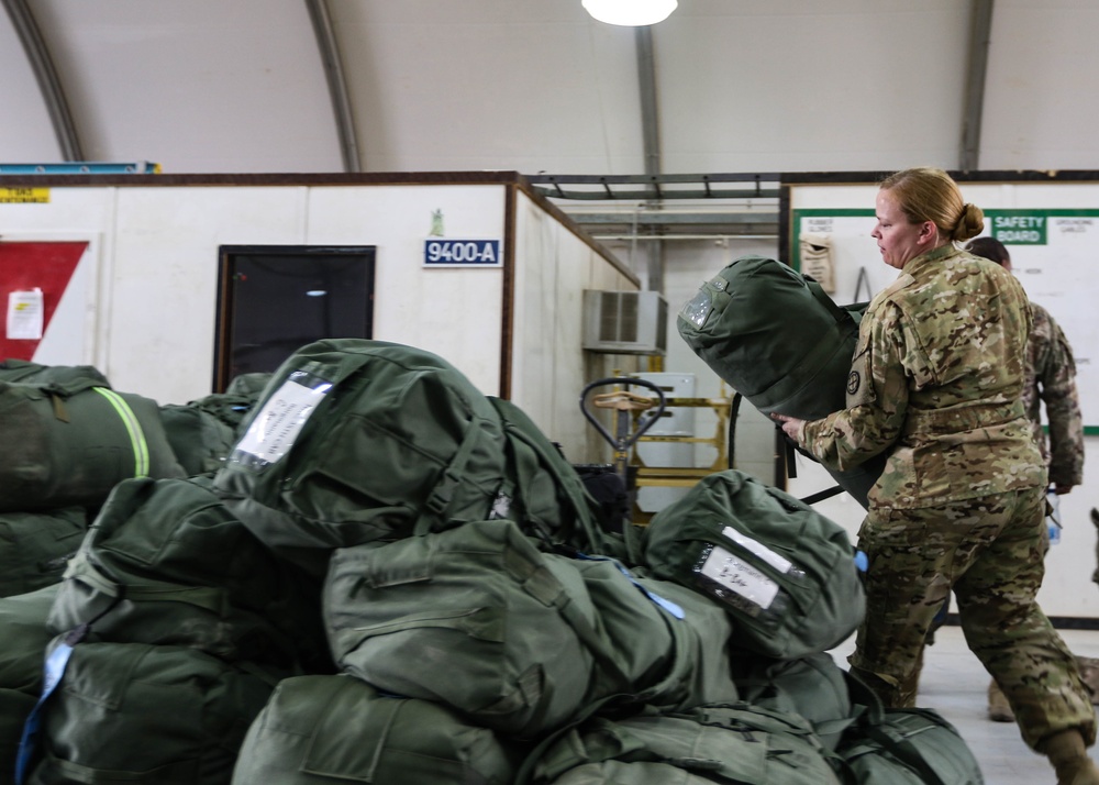 Loading up and out, Headquarters Company prepares to return home