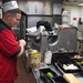 U.S. Sailor prepares dinner for Sailors aboard USS Mobile Bay