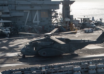 An MH-53E Sea Dragon unloads on the flight deck