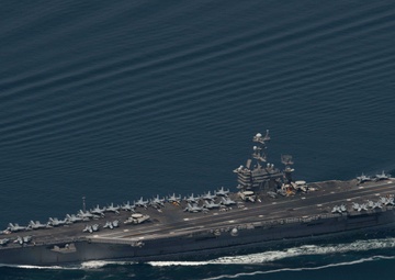 The aircraft carrier USS John C. Stennis (CVN 74) steams in the Strait of Hormuz