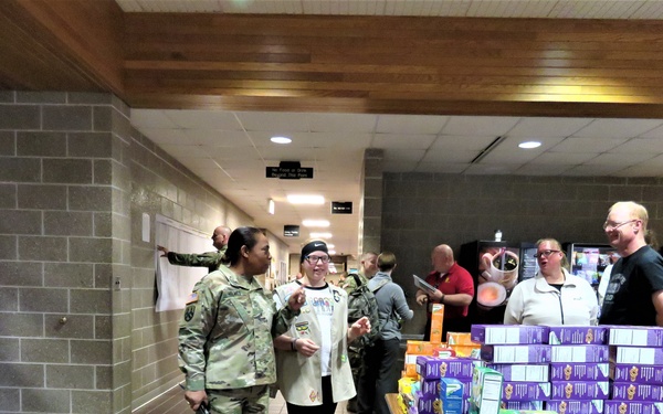 Minnesota Girl Scouts deliver cookies to troops at Fort McCoy