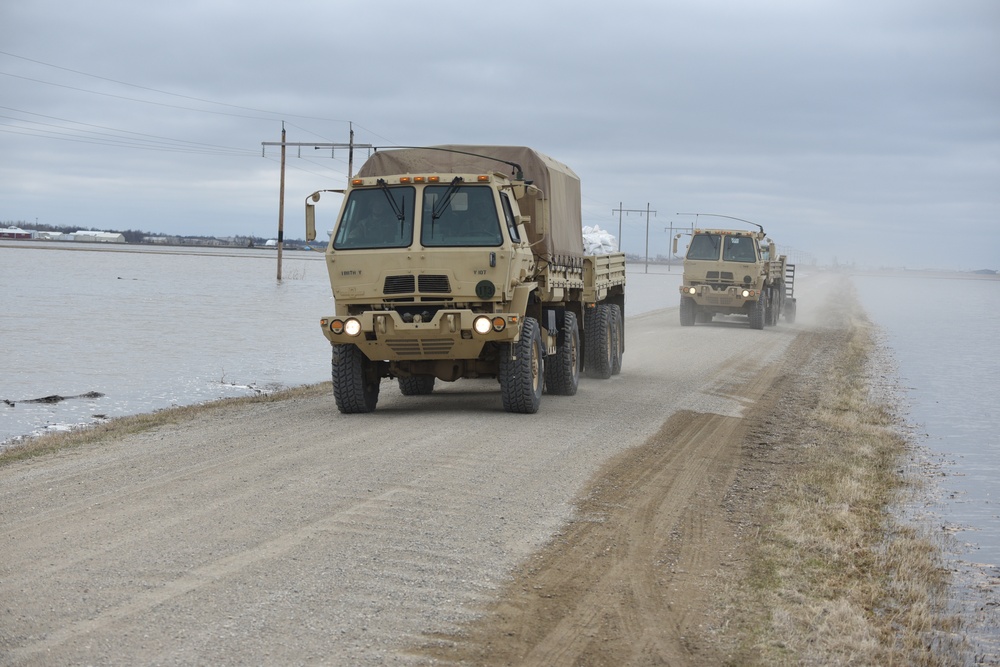 N.D. Army Guard continues flood fight with QRF sandbag deliveries in Cass County