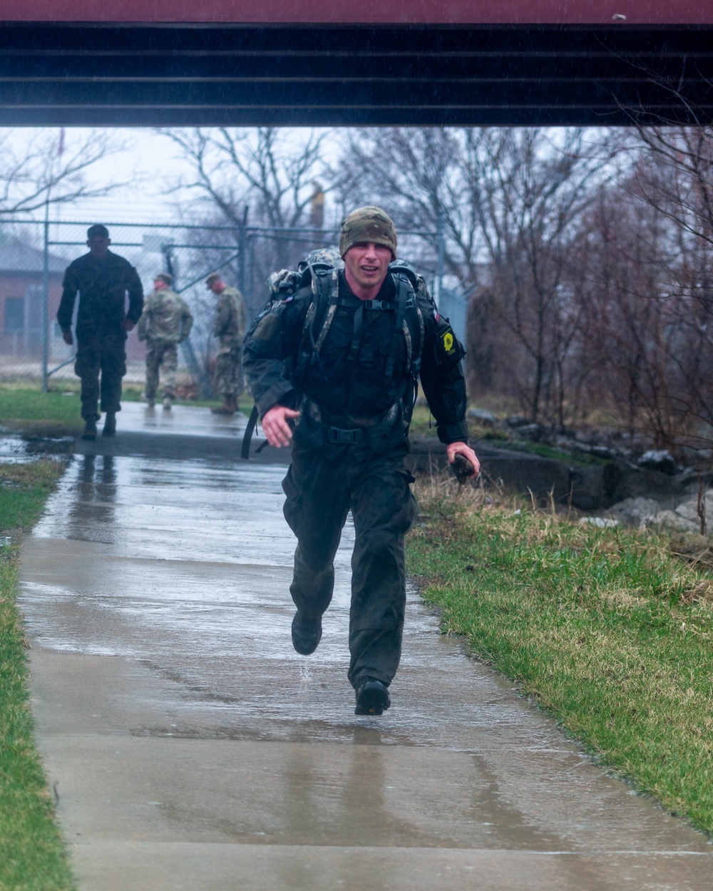 Sgt. Krzysztof Kolonko finishes the road march of the Illinois Best Warrior Competition.
