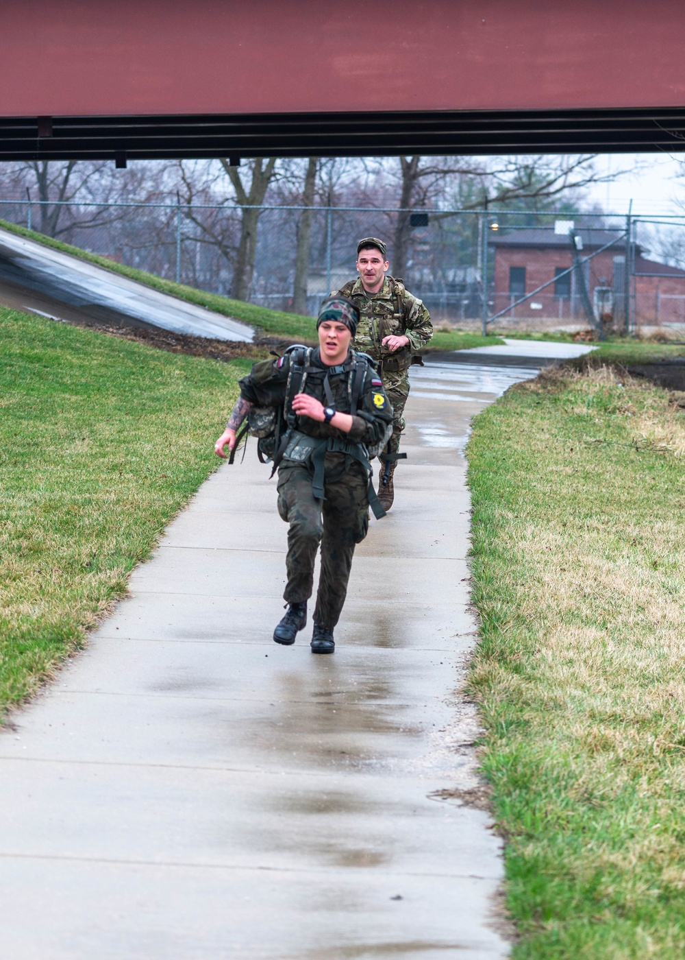 Senior Corporal Sandra Nagot completes the road march at the Illinois Best Warrior Competition