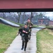 Senior Corporal Sandra Nagot completes the road march at the Illinois Best Warrior Competition