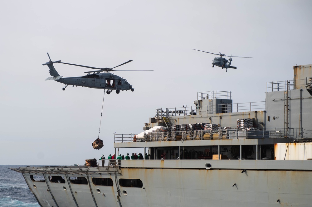 USS Abraham Lincoln Conducts Vertical Replenishment with USNS Arctic