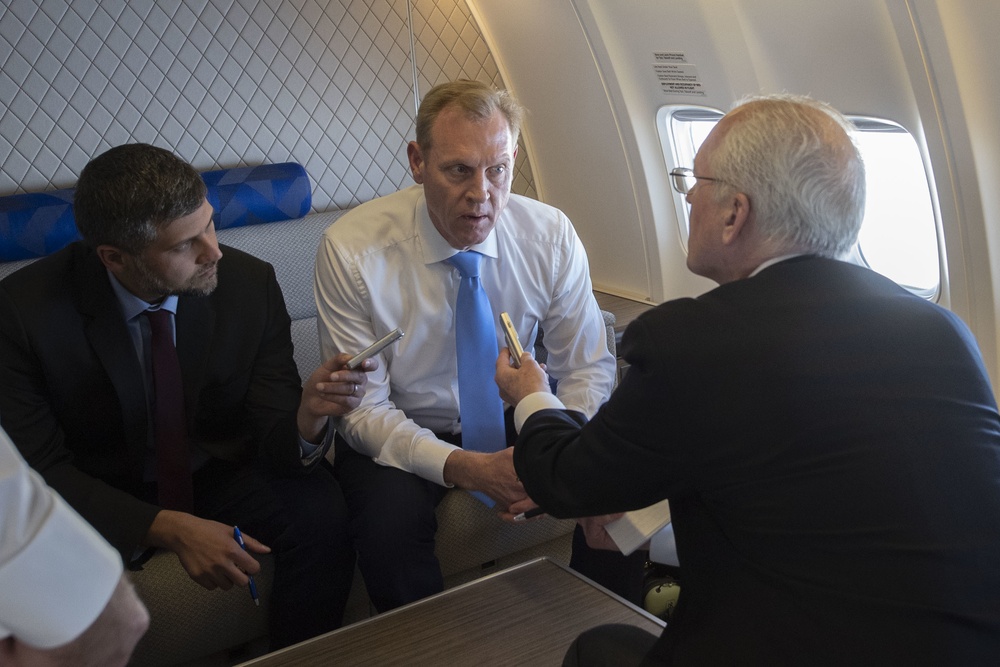 Acting Secretary of Defense Speaks to Reporters En Route to Andrews