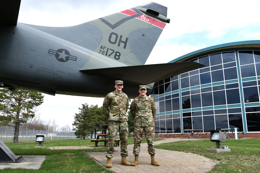 Crum brothers serve side-by-side