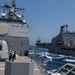USS Mobile Bay and USS John C. Stennis conduct a replenishment-at-sea with USNS Tippecanoe