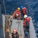 U.S. Sailor conducts small boat operations from USS Mobile Bay