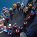 U.S. Sailors debrief after conducting small boat operations from USS Mobile Bay