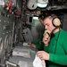 U.S. Sailor communicates using a sound-powered telephone