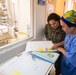 Pacific Partnership 2019 Personnel discuss medical procedures with Malaysian Doctors