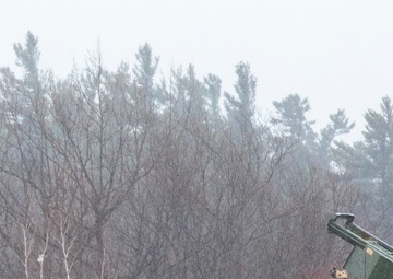 Soldiers prepare to fire HIMARS