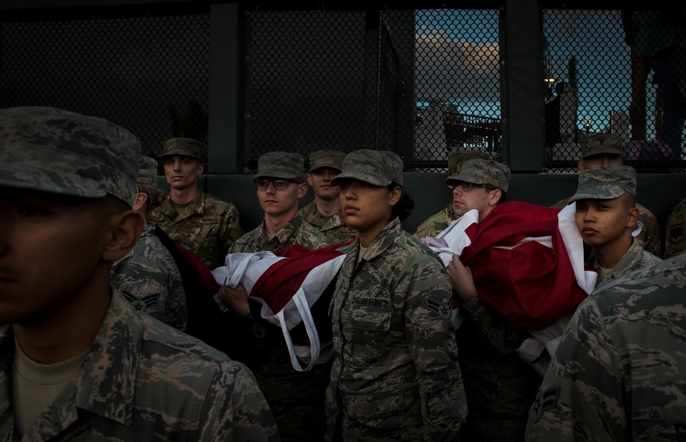 Airmen hold flag during LV Aviators Opening Night
