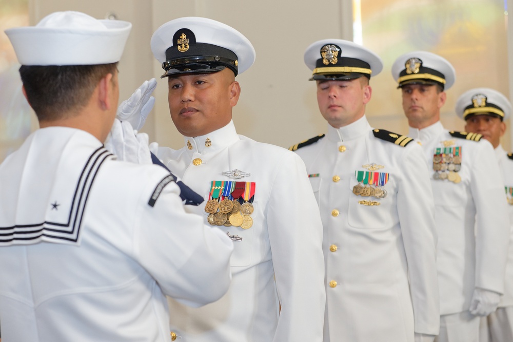 The Flag Detail passes the national ensign