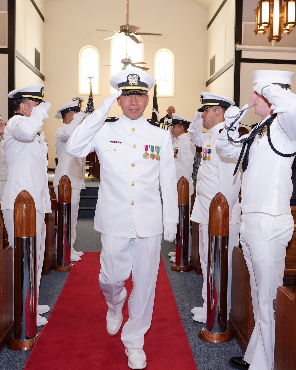 Lt. Cmdr. Felix Villanueva goes ashore for the last time