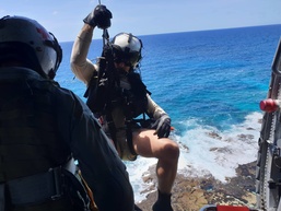 HSC-25 Rescues two from sunken watercraft