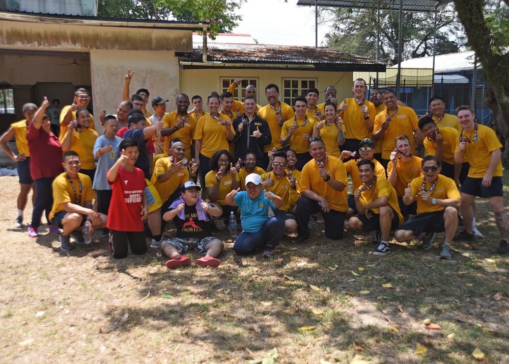 USS Blue Ridge/C7F team participates in a community relations event at the Seri Mengasih Center in Kota Kinabalu, Malaysia