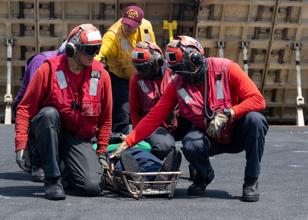 U.S. Sailors participate in a mass casualty drill