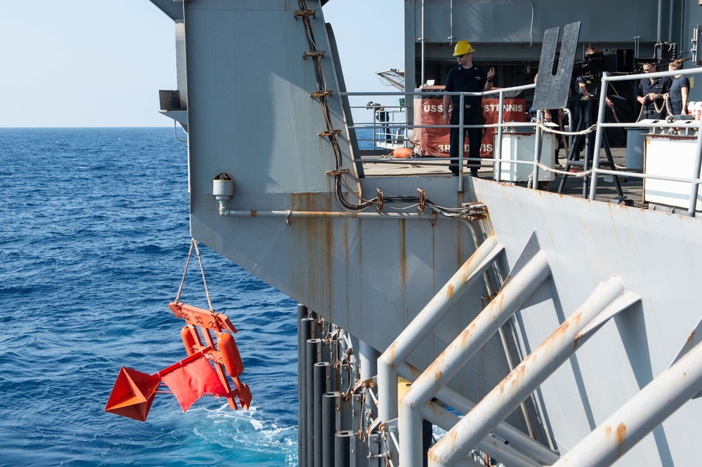 U.S. Sailor directs a Larne target