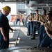 U.S. Sailor directs Sailors on line handling